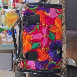 Cross over body bag/purse. Brand new, never used, but no tags.